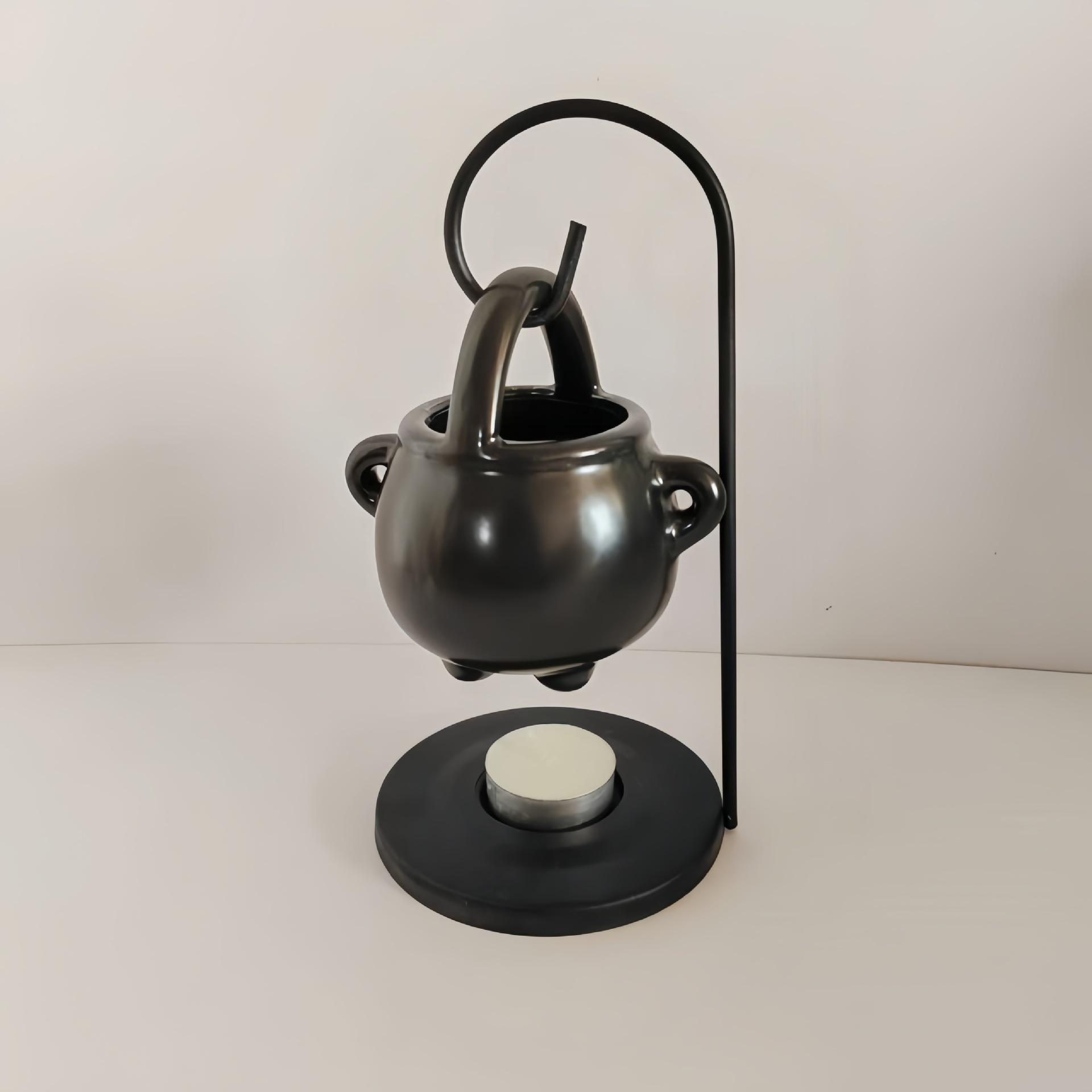 

Witch s Brew Cup-Shaped Essential Oil Burner with Iron Stand