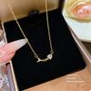 Elegant Gold Fishbone Necklace - Fashionable Clavicle Chain for Women with Stylish Fishbone Pendant.