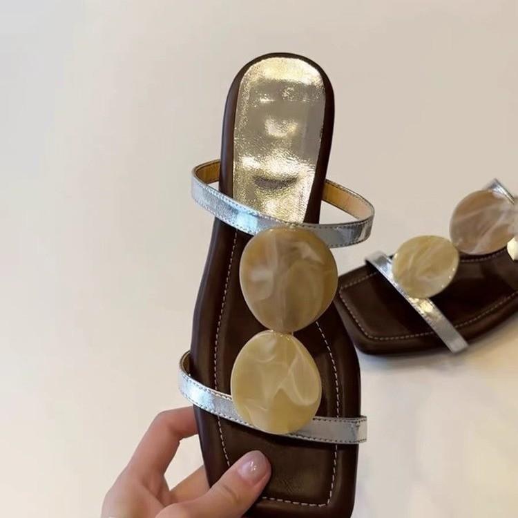 

Niche French one-word cool slippers women s open-toed square head temperament Roman shoes flat beach shoes 35