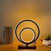 Modern and Minimalist Ring-shaped Desktop and Bedside Lamp. It Is Powered by USB and Has the Function of Three-color Dimming.
