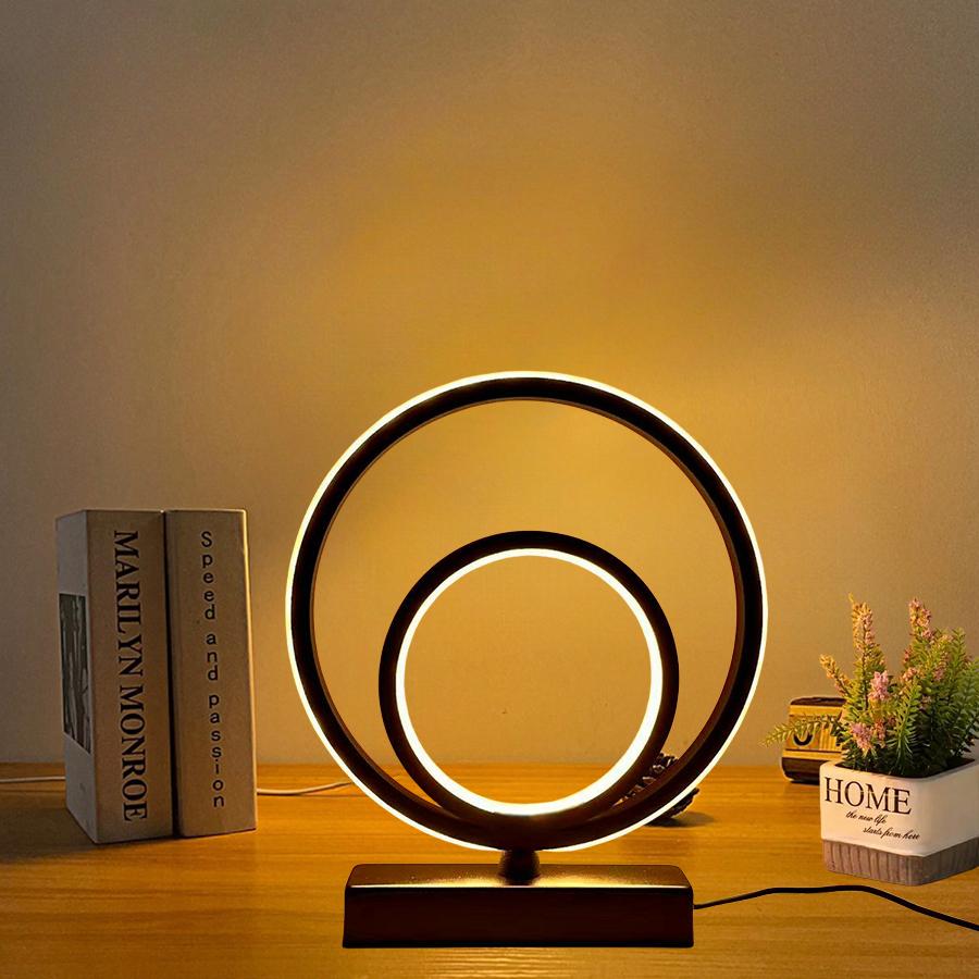 Modern and Minimalist Ring-shaped Desktop and Bedside Lamp. It Is Powered by USB and Has the Function of Three-color Dimming.