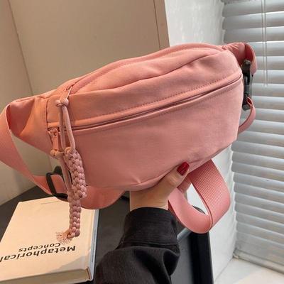 Bolso bandolera deportivo japonés 2024 para mujer: tendencia coreana, diseño versátil para pecho y cintura, estilo mensajero sencillo.