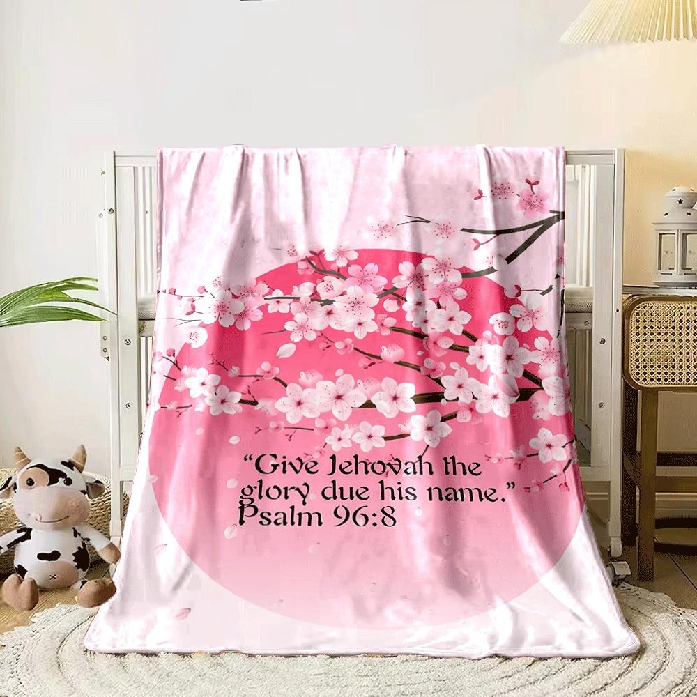 Pink cherry blossoms on branches with a gradient red-pink circle backdrop. for all seasons blanket lunch break throw gift 80cm x 120cm