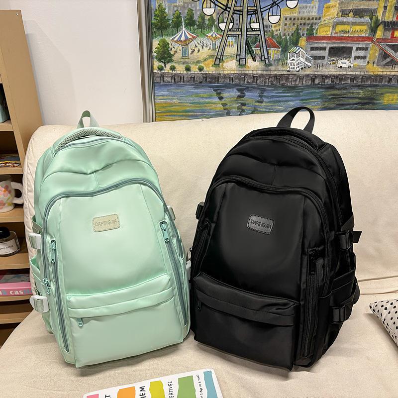 Large capacity backpack women's new backpack high-end college student schoolbag multi-pocket travel bag men