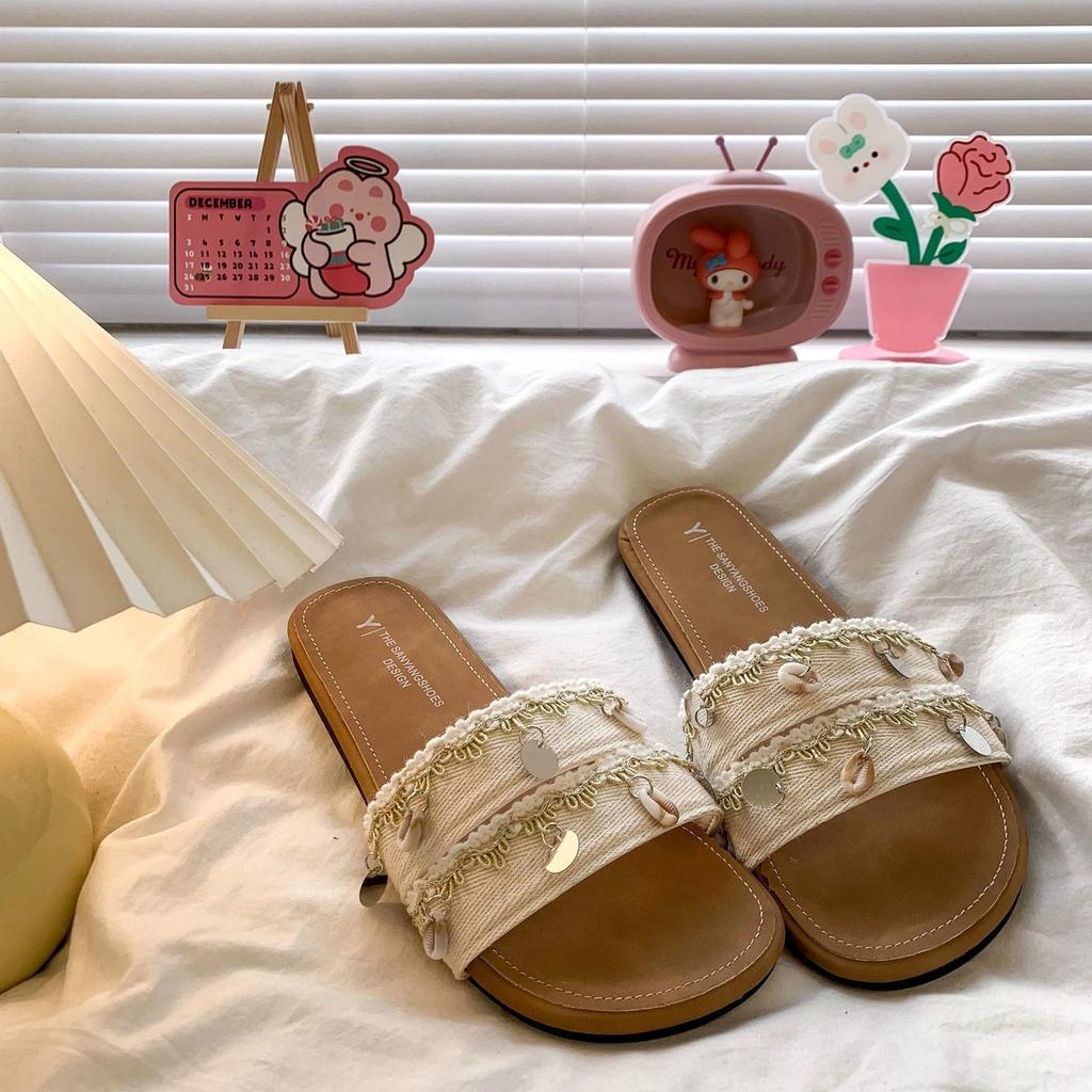 Seaside vacation wind one-word casual with skirt shoes 2025 new flat-bottomed cross with cool slippers women's summer wear