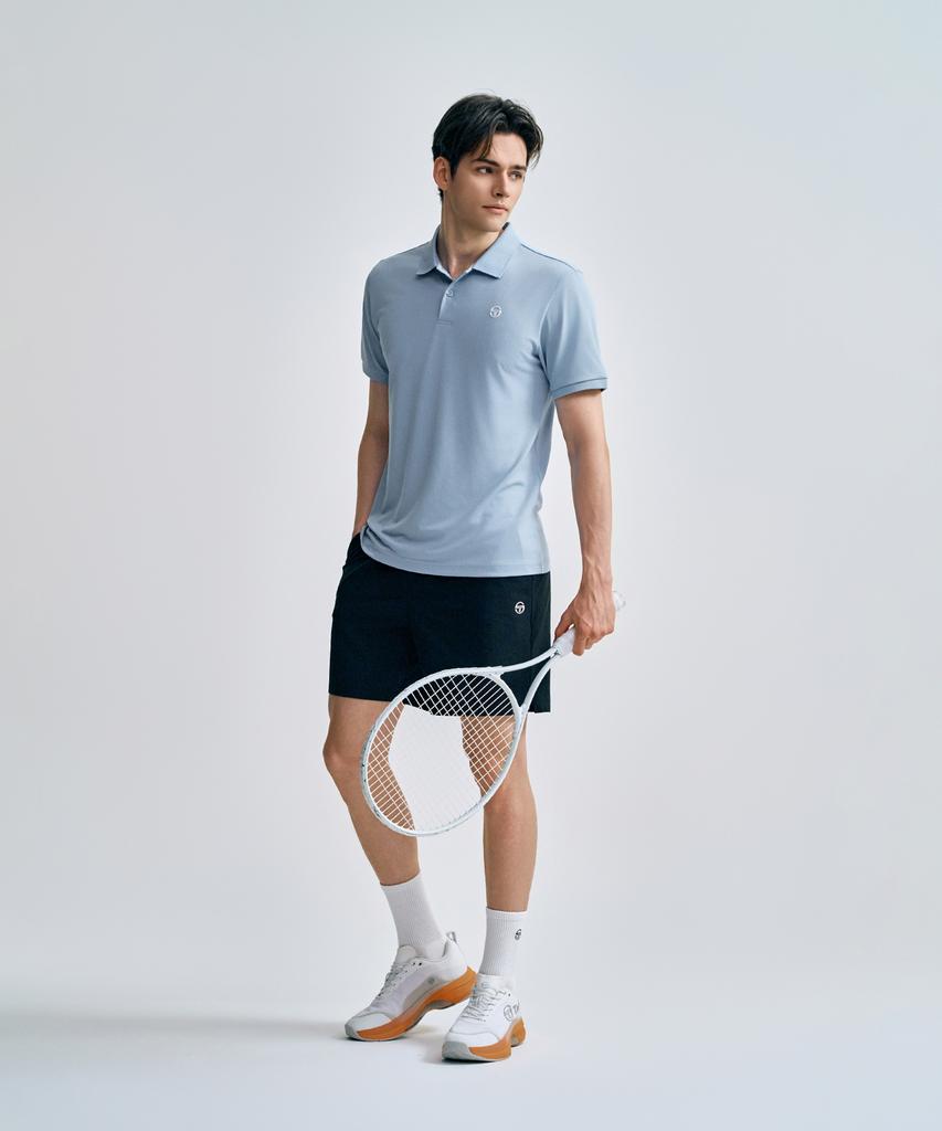 SERGIO TACCHINI M Playing Polo