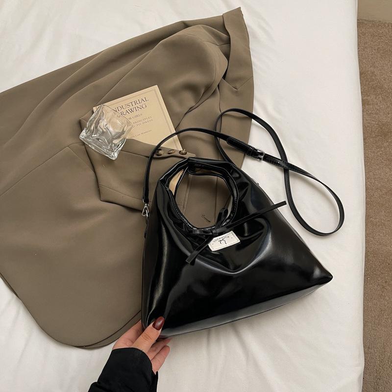 

Portable bow dumpling bag women s fashion shoulder bag 2025 new simple and versatile women s bag