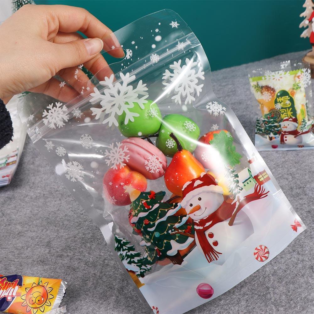 50/100Pcs Plastic Christmas Gifts Bags Snowman Snowflake Pattern Candy Packaging Bags  Home Use