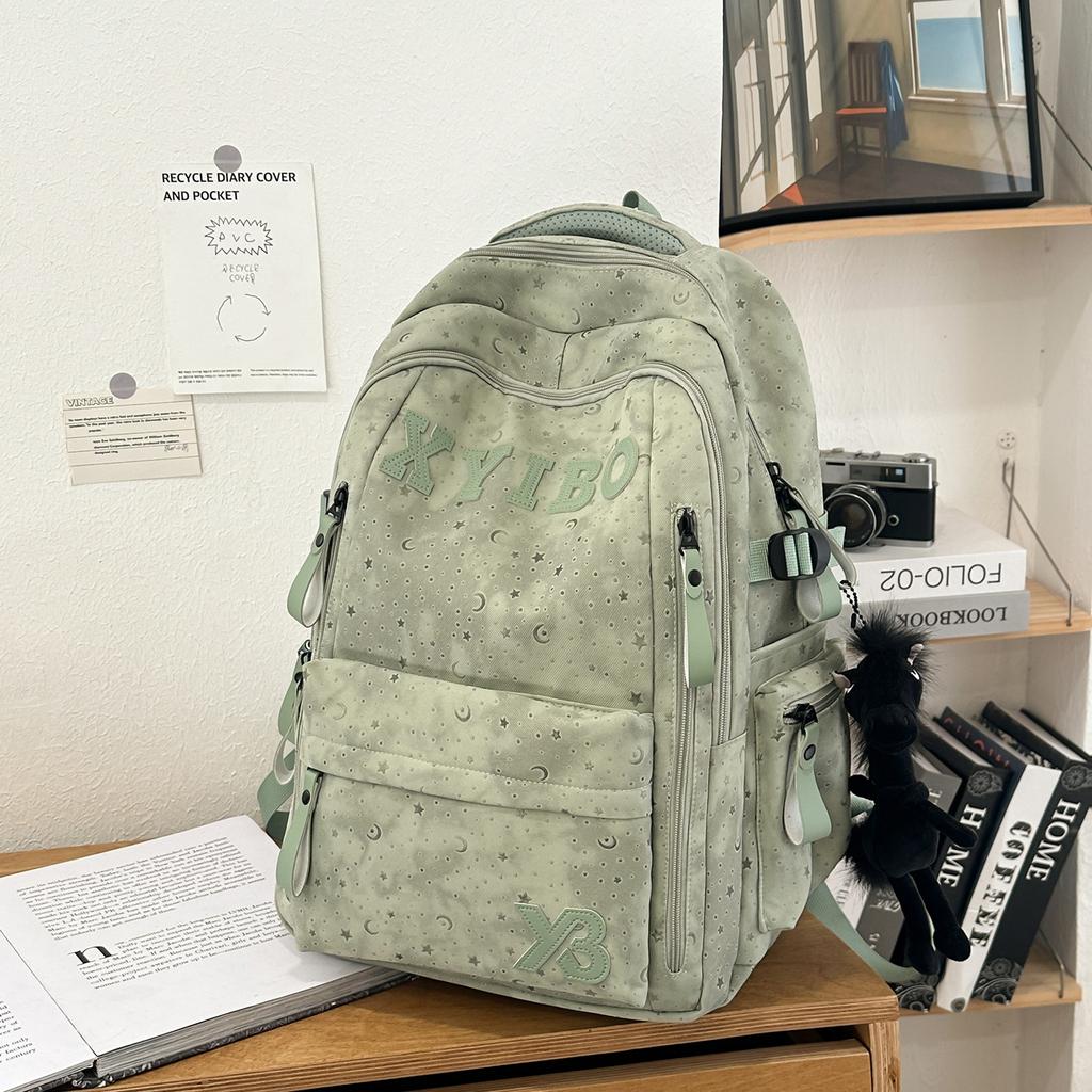 Zaino nuovo 1011 ad alta capacità, zaino per scuola media, scuola superiore, riduzione della marea per studenti universitari, protezione della colonna vertebrale, leggero