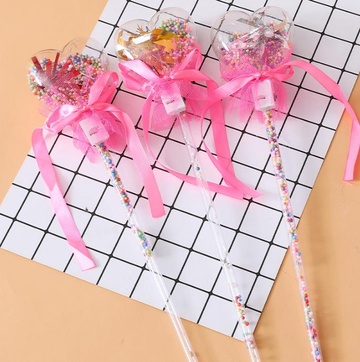 Heart Shaped Light Up Wand with Starry Design and Decorative Ribbon for Kids Party Favor and Play Accessory with Glitter Filled Handle