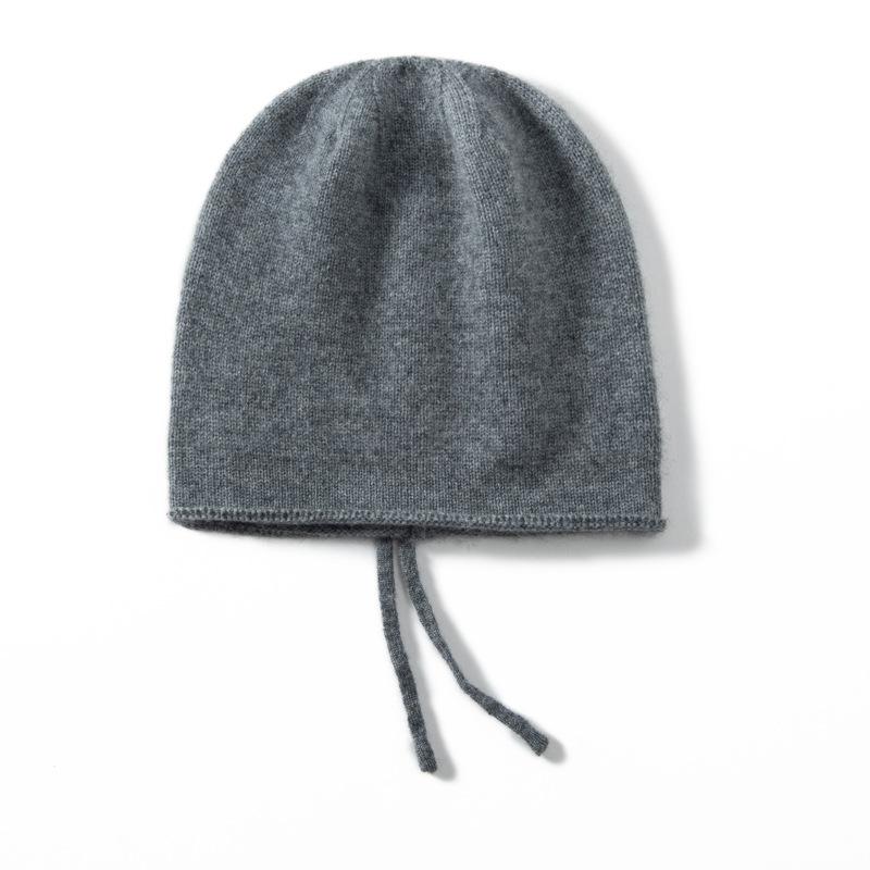 Autumn and Winter New Cashmere Women's Knitted Hat Drawstring Warm Ear Protection Fashion Hat Crimping Stack Hat Cold Hat