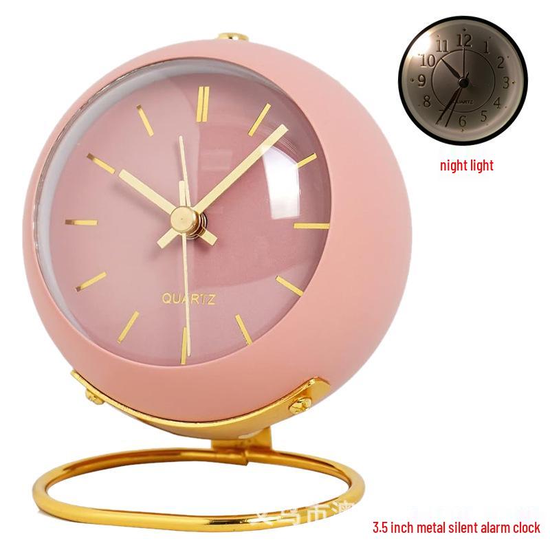 Silent Metal Alarm Clock with Night Light and Gold Stamped Spherical Face - Perfect for Students and Children.