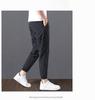 2023 Men's Korean-Style Ice Silk Casual Pants, Quick-Drying, Trendy, Loose-Fit Nine-Point Sports Pants for Summer.