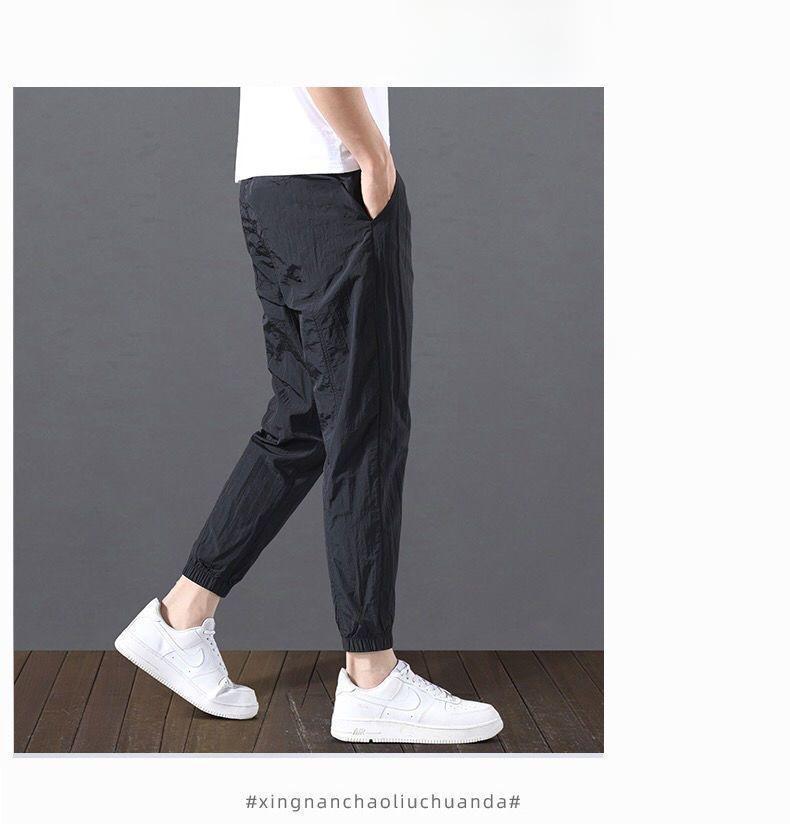 2023 Men's Korean-Style Ice Silk Casual Pants, Quick-Drying, Trendy, Loose-Fit Nine-Point Sports Pants for Summer.
