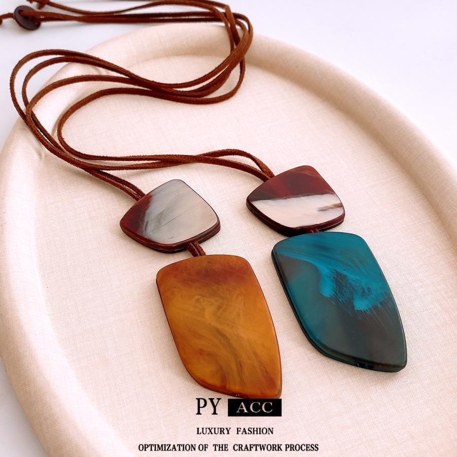 Trendy Ethnic Ox Horn Pendant Necklace - Versatile Sweater Chain for Women’s Fashion