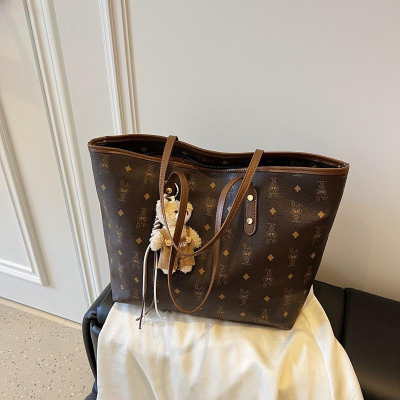 Frühlings- und Sommer-Großraumtasche 2025 neue Damenhandtasche Mode Pendler Retro Umhängetasche Studentin Unterricht Tragetasche