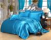 Red Wedding Four-Piece Set: Imitation Mulberry Silk Duvet Cover and Bed Sheet in Solid Color, Double Size, Faux Tencel Tribute Satin.