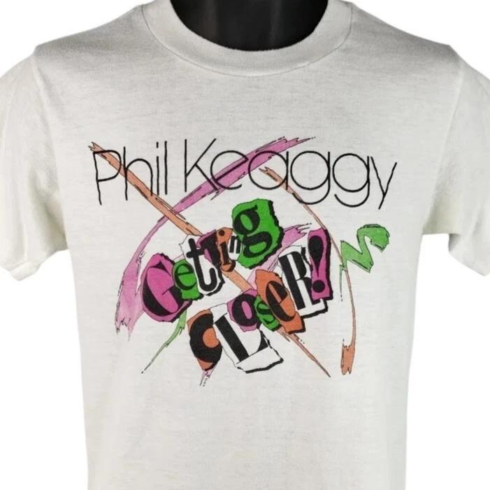 

Vintage Phil Keaggy 100% Cotton T-shirt Mens Tees Top Mens Size Small White 80s 1985 Getting Closer USA 3XL