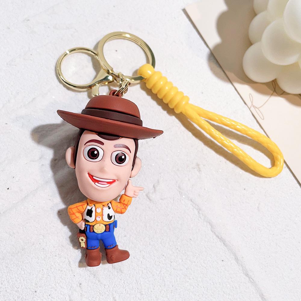 Best-Selling Toy Story Figures Keychain: Three-Eyed Alien, Buzz Lightyear, and Strawberry Bear Charms