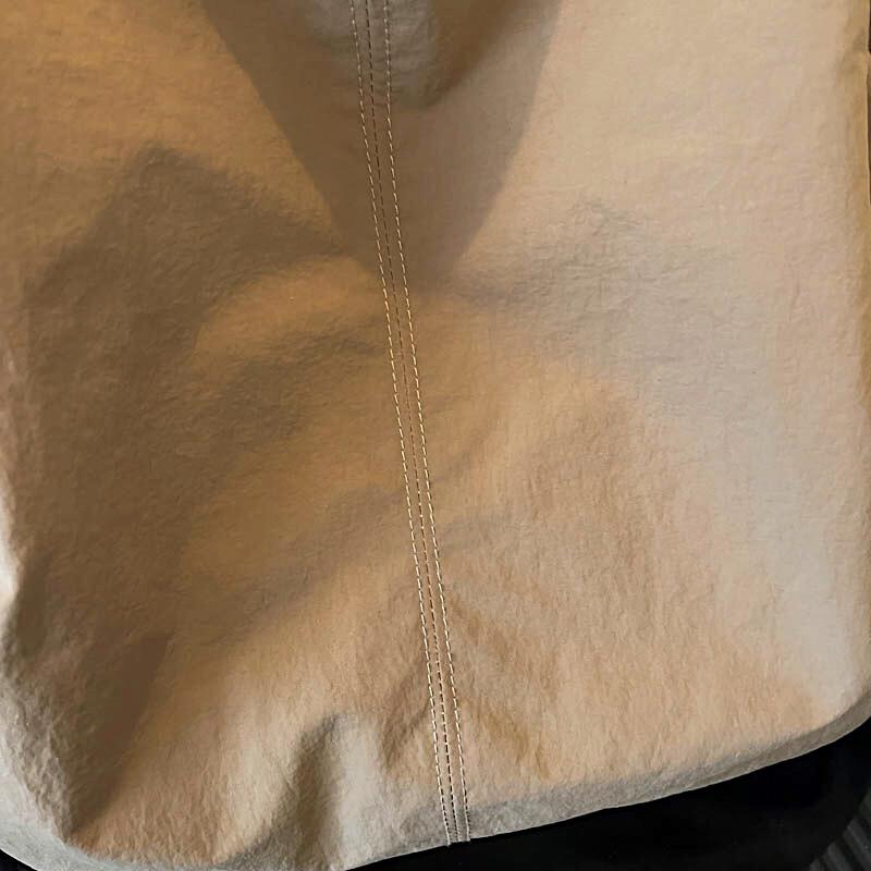 Minimalist Nylon Tote Bag with Spacious Design and Durable Handles Perfect for Everyday Use and Shopping