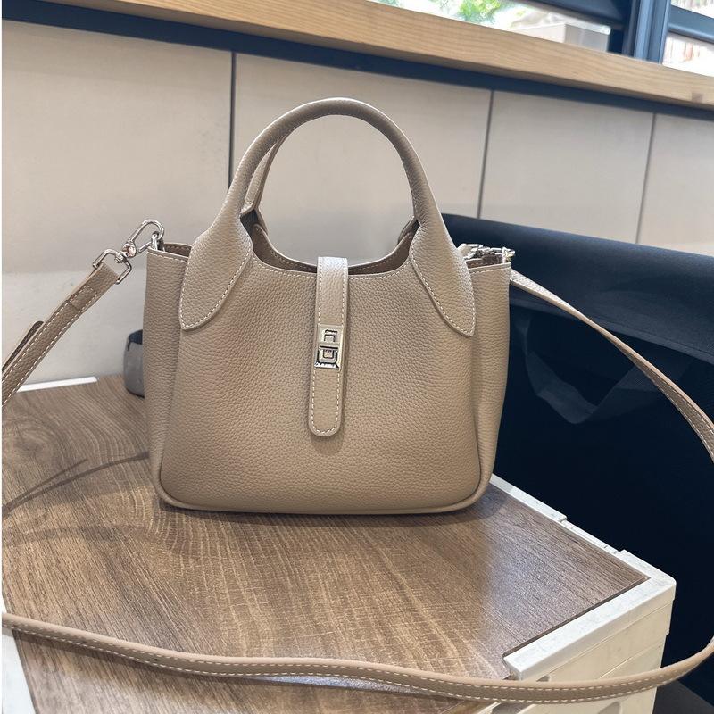 New Leather Women's Bag First Layer Cowhide Li Pattern Leather High-end Feeling Hand Carrying Bucket Bag Women's Lychee Pattern Basket Bag