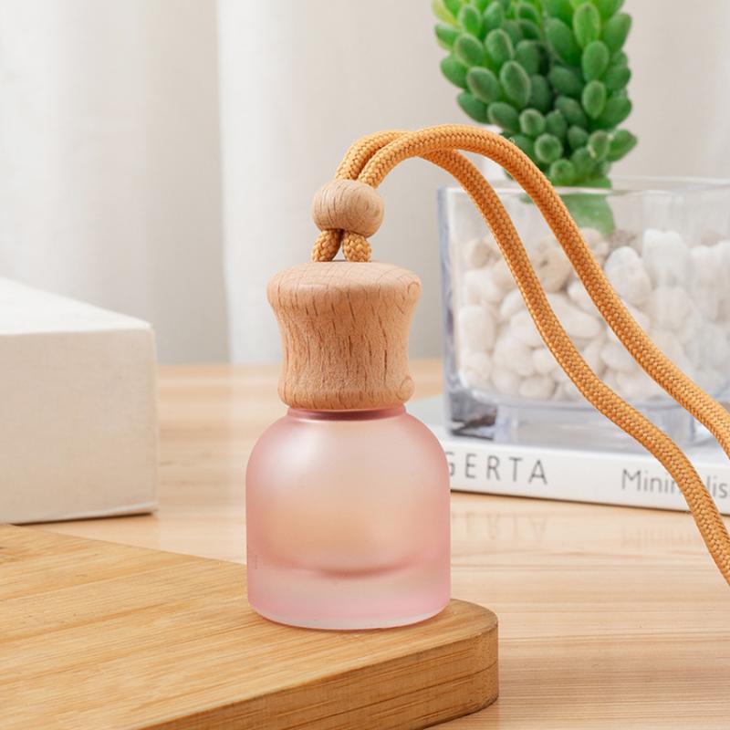 1 Stück nachfüllbare Auto ätherisches Öl Diffusor Flasche 11 ml Leerer Auto Lufterfrischer Anhänger Parfüm Glasflasche mit Holzkappen