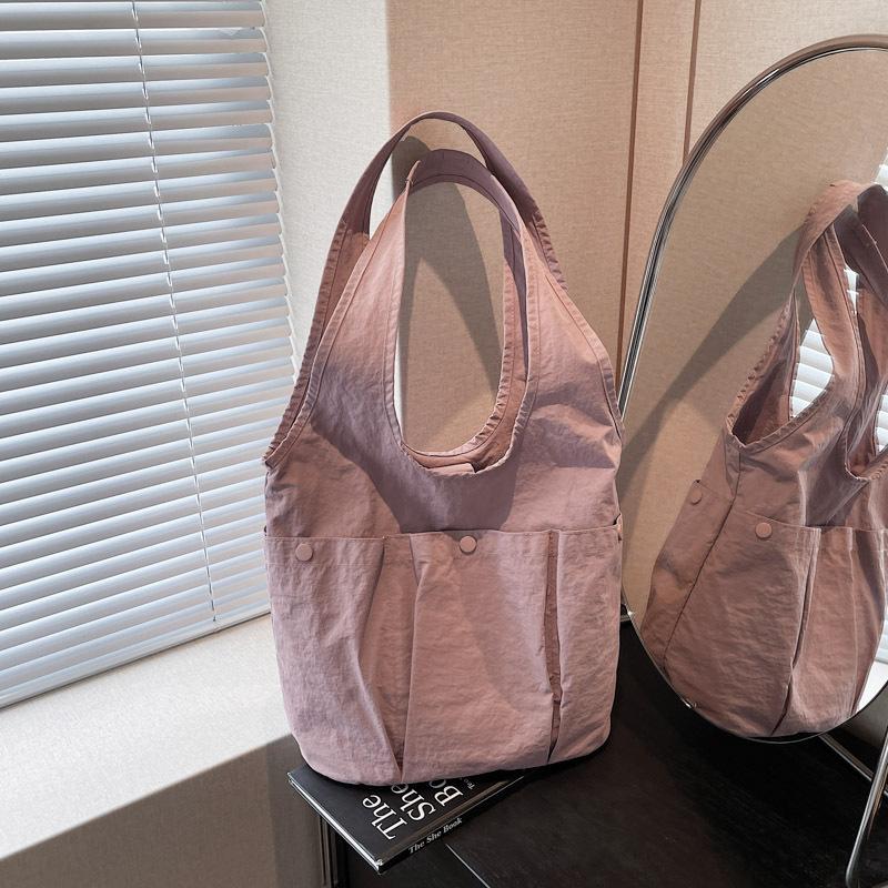 

Летняя сумка-тоут 2025 повседневная простая маленькая свежая сумка через плечо уличная тканевая сумка однотонная женская розовый