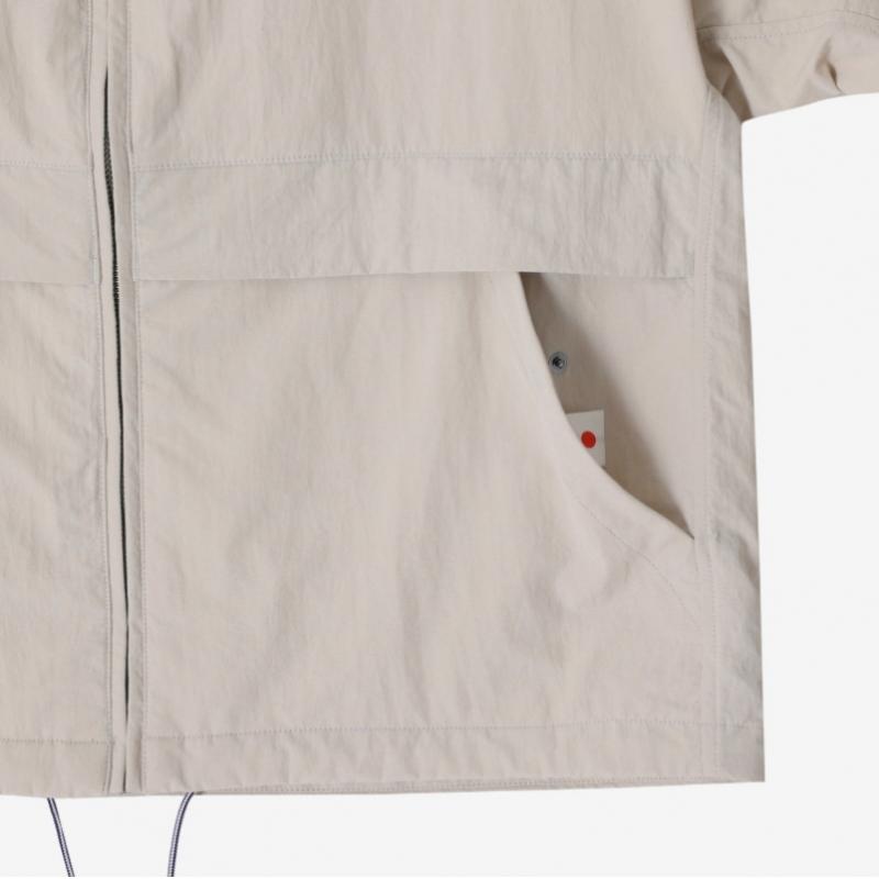 Nanamica Wendbare Kapuzen-Coachjacke S25sa002e