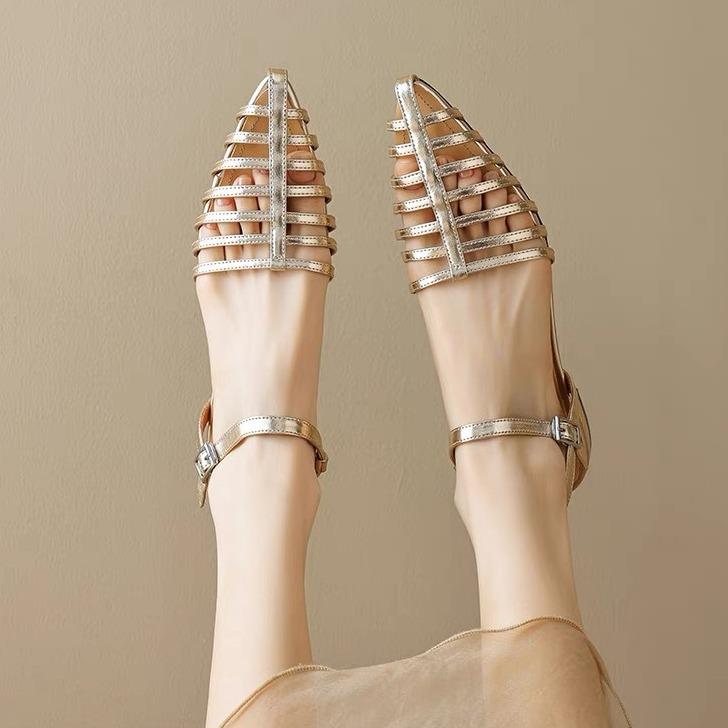 French niche bag head sandals women's summer black high-end flat-soled hollow women's shoes retro pointed Roman single shoes