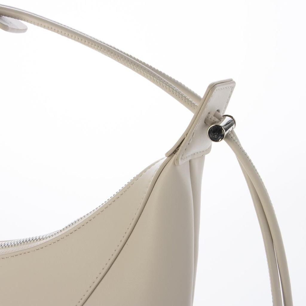 Half-moon cord handle shoulder bag