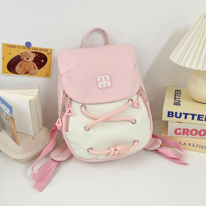 New Korean version contrasting color personalized backpack women s commuting versatile lightweight schoolbag women s fashion trend compact backpack