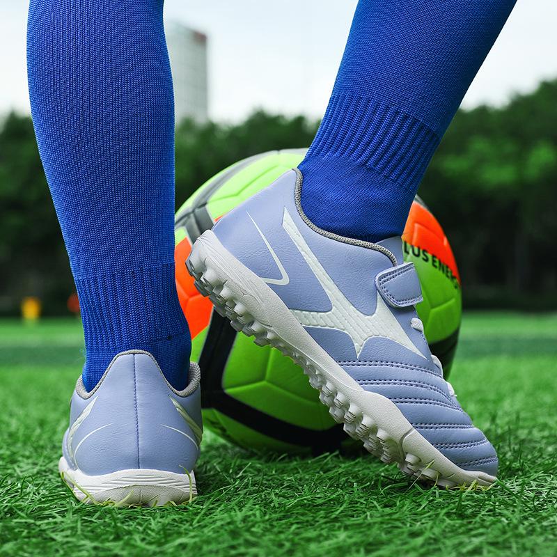 Manufacturer football shoes men's flat-soled adult grass spiked shoes adolescent boys and girls primary school students training TF broken spiked sho