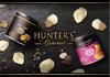 Kartoffel-Schwarztrüffel 40 g x 12 Stück, verkauft in einer Mini-Packung, wird mit einem Original-Handtuch geliefert, um sich nach dem Verzehr die Hände abzuwischen. Hunter's Chips, Geschmack, Stücke, Karton, Einzelportion,