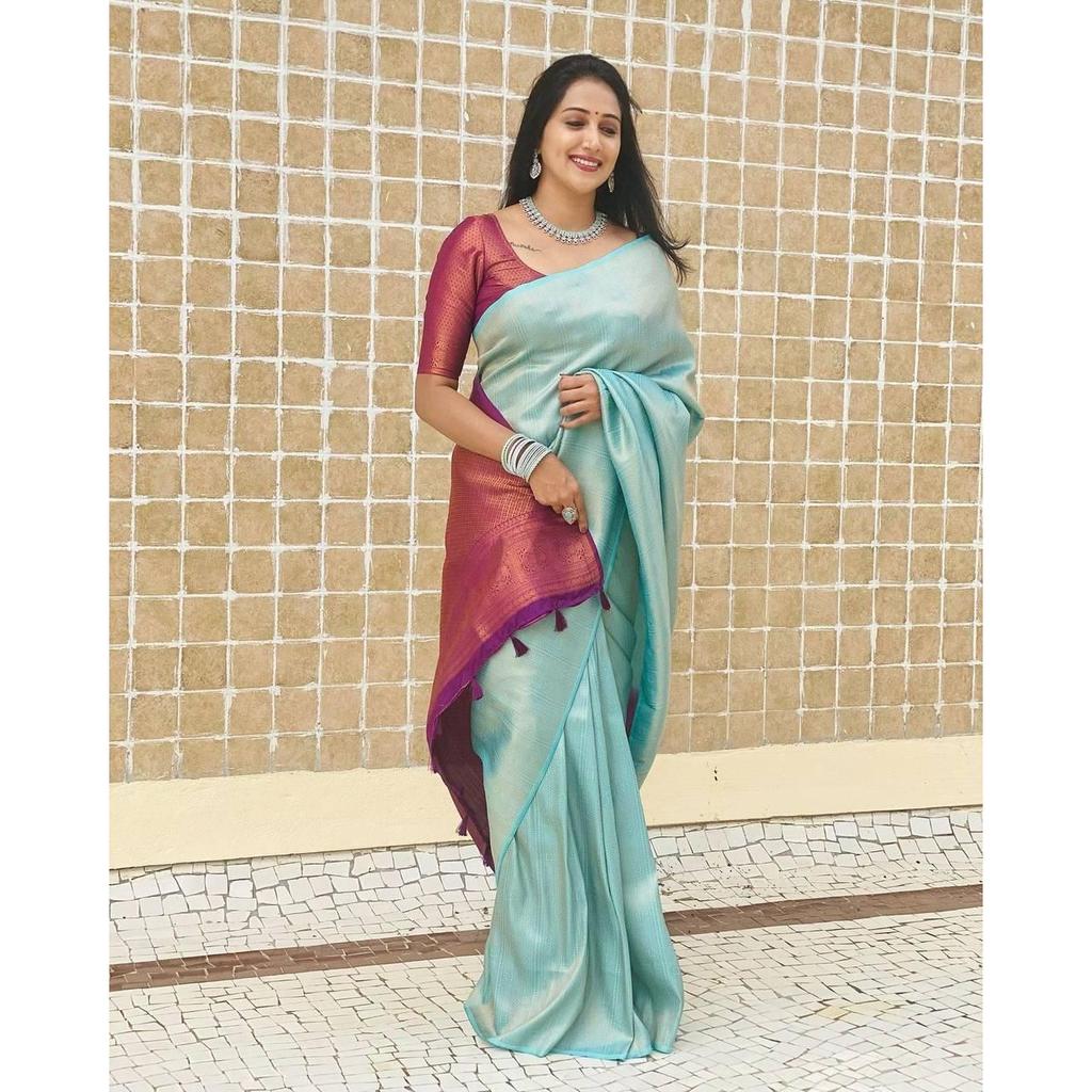 ALMAARI store is adorned with beautiful Zari work in form of traditional motifs. This beautiful saree is elegantly decorated with gorgeous