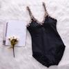 New Korean version solid color suspender V-neck one-piece triangular fungus edge swimsuit female slim slim and thin vacation swimsuit