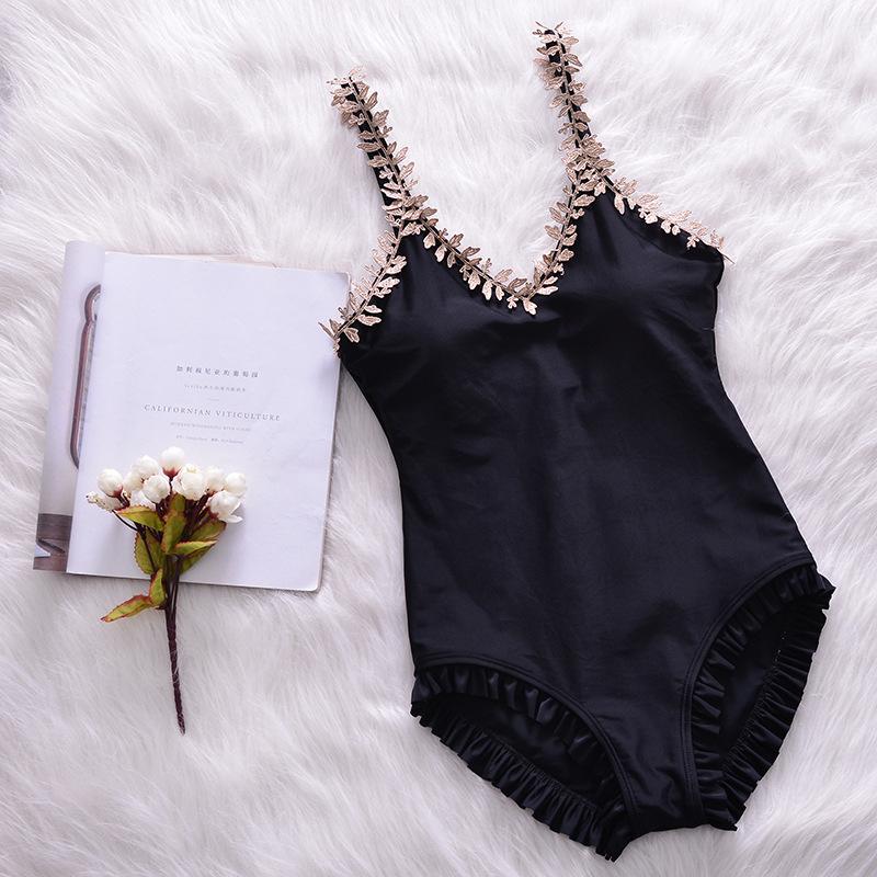 New Korean version solid color suspender V-neck one-piece triangular fungus edge swimsuit female slim slim and thin vacation swimsuit