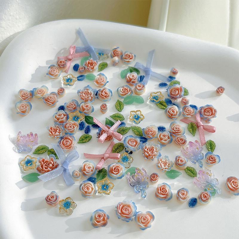 100Pcs Diy Nail Art Decor 3D Blue Pink Roses Garden Nail Drill Mixed Pearl Fabric Butterfly Knot Leaf Manicure Diamond Accessory