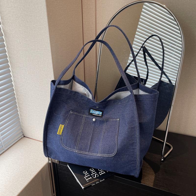 

Simple and large-capacity denim tote bag women s new versatile commuter shoulder bag portable fashion shopping bag tide темно-синий
