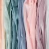 Shimmering satin encrypted solid color organza fabric suitable for wedding dresses formal gowns and designer clothing fabrics