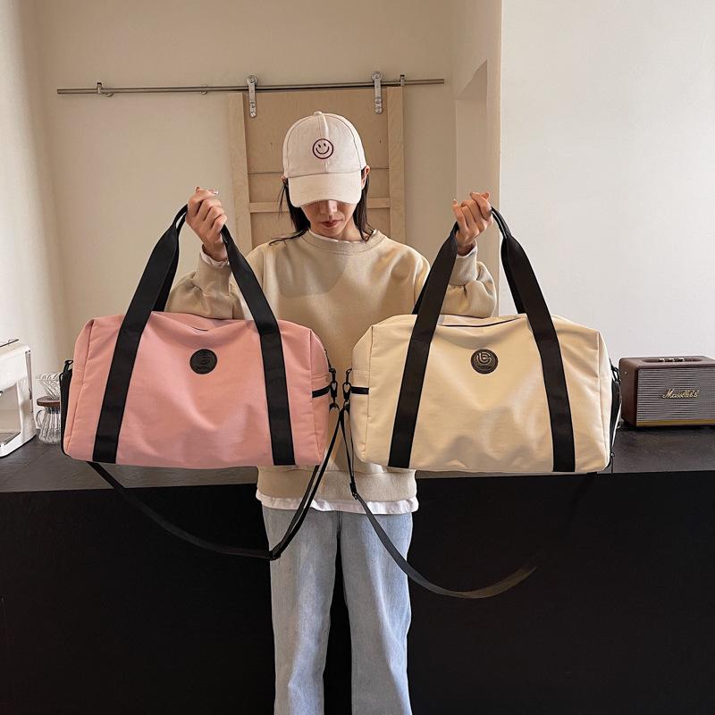 Solid color high-end short-trip bag can be set with tie rod, independent shoe position, dry and wet separation, multi-functional luggage boarding bag