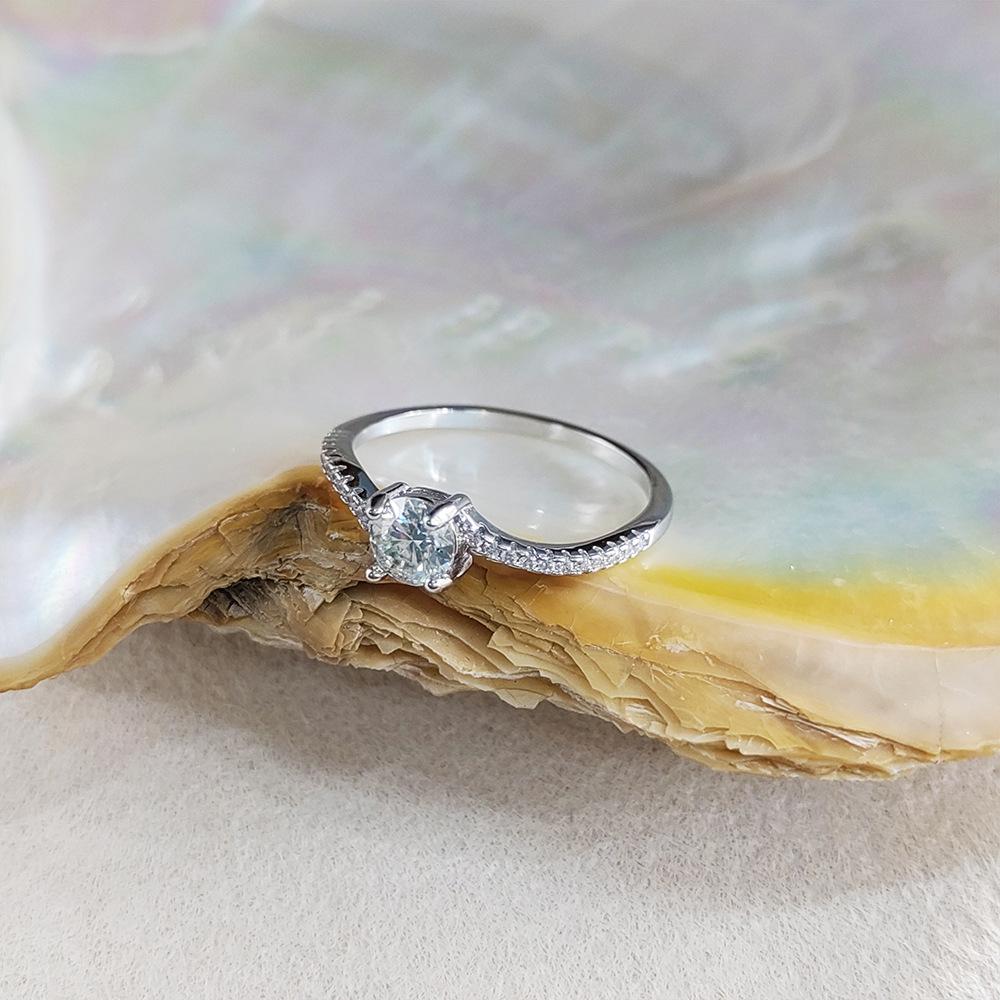 S925 Sterling Silver 50-Point Twisted Moissanite Ring with Four-Prong Setting
