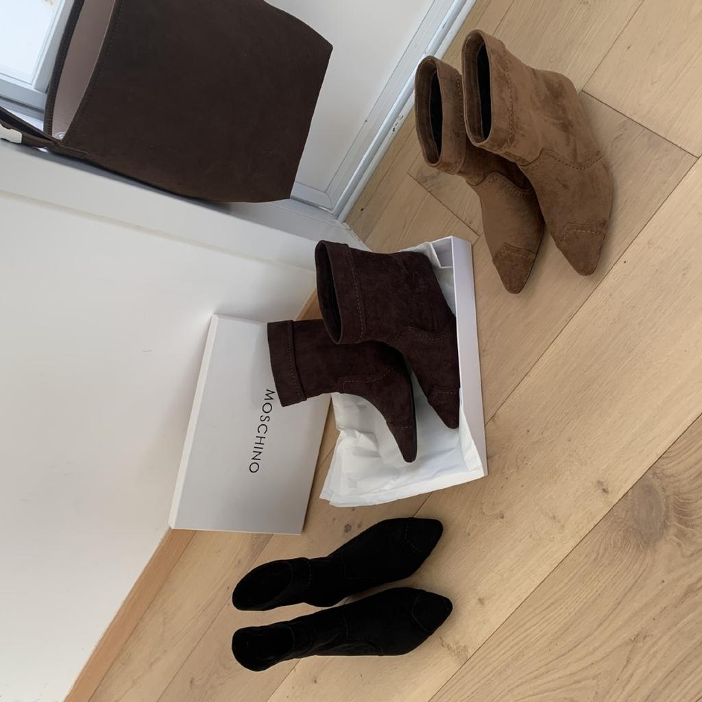 2025 autumn and winter new temperament pointed head low slope heel Chelsea thin niche low tube women's short boots