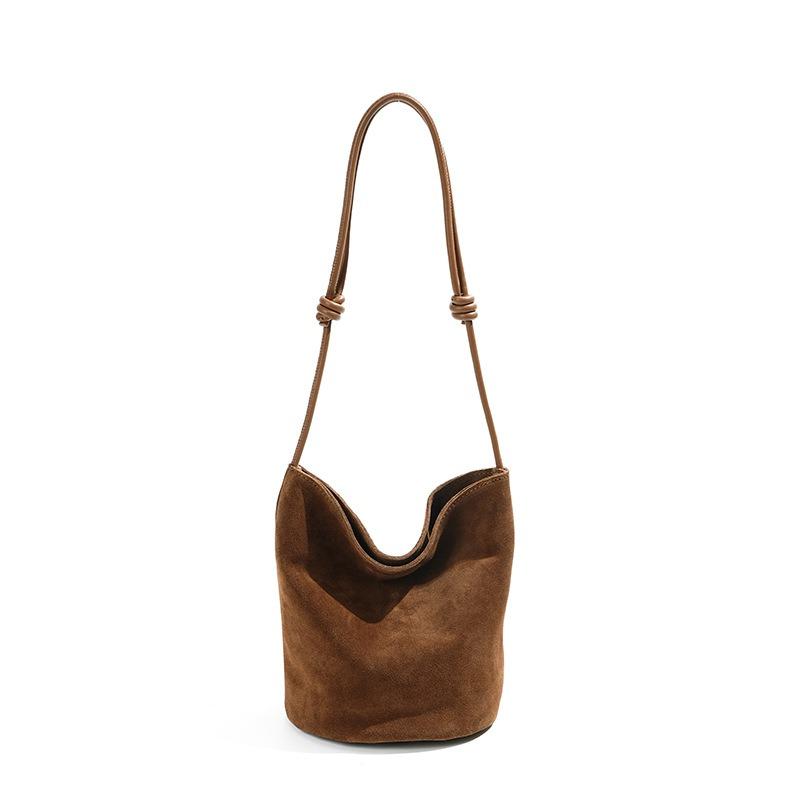 

New matte cowhide exquisite bucket vegetable basket bag, niche suede commuting high-end handbag women коричневий