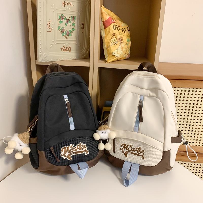 Japanese college students casual backpack girl college style retro backpack women's light junior high school student schoolbag