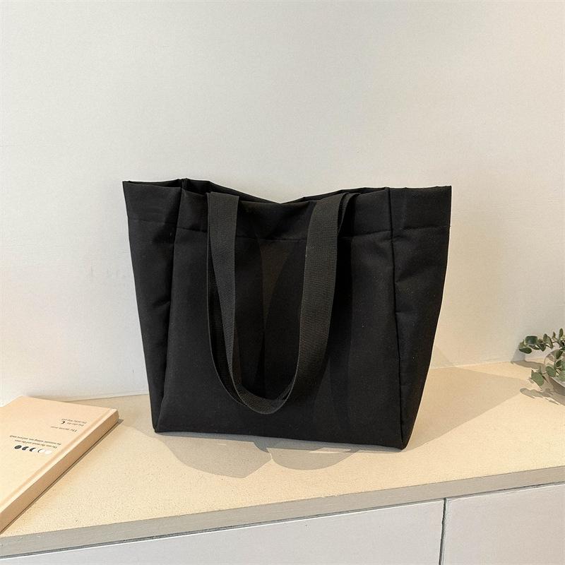 Bag women's new solid color large-capacity canvas shoulder bag simple commuter student tote bag shopping bag tide