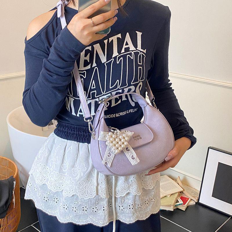 Sense of Hand Crescent Shoulder Bag: 2025 New Niche Design Dumpling-Style Crossbody for Women.