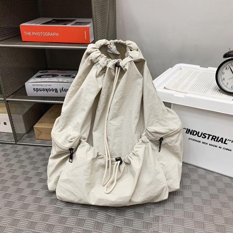 School bag new folding backpack multi-pocket bundle design simple solid color storage bag leisure travel couple backpack tide