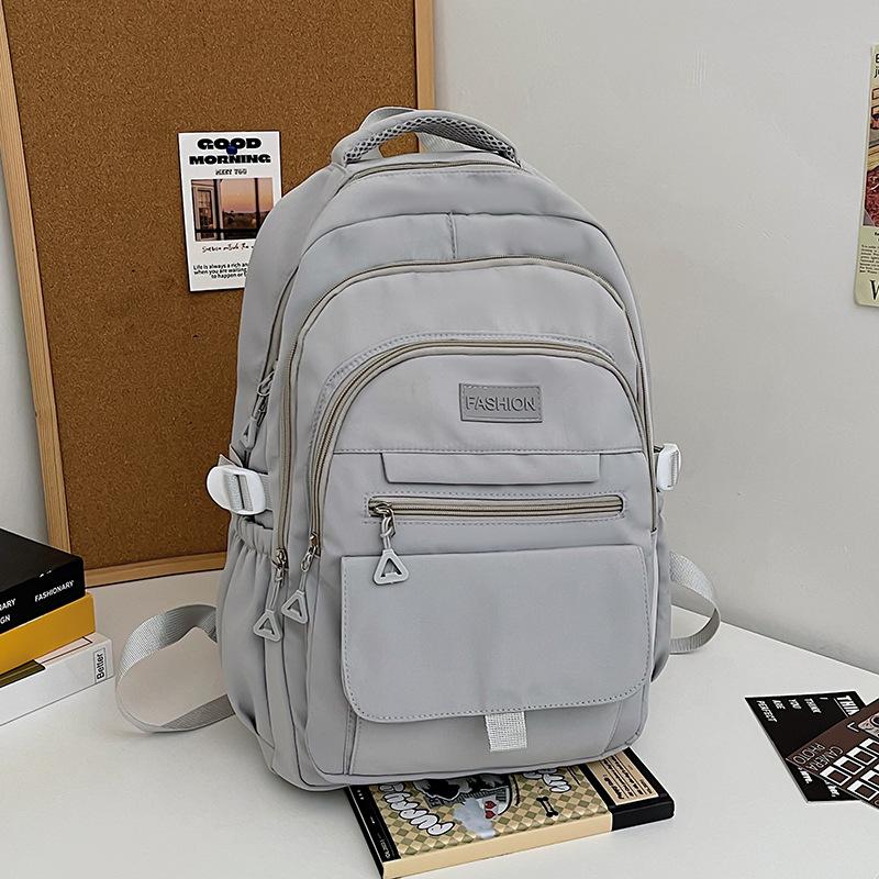 Korean version of simple backpack large capacity junior high school male and female students campus schoolbag backpack light
