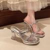 Waterproof table with one-word strap with skirt, sandals, slippers, women's 2025 new transparent high-heeled crystal heel, and sandals for summer we