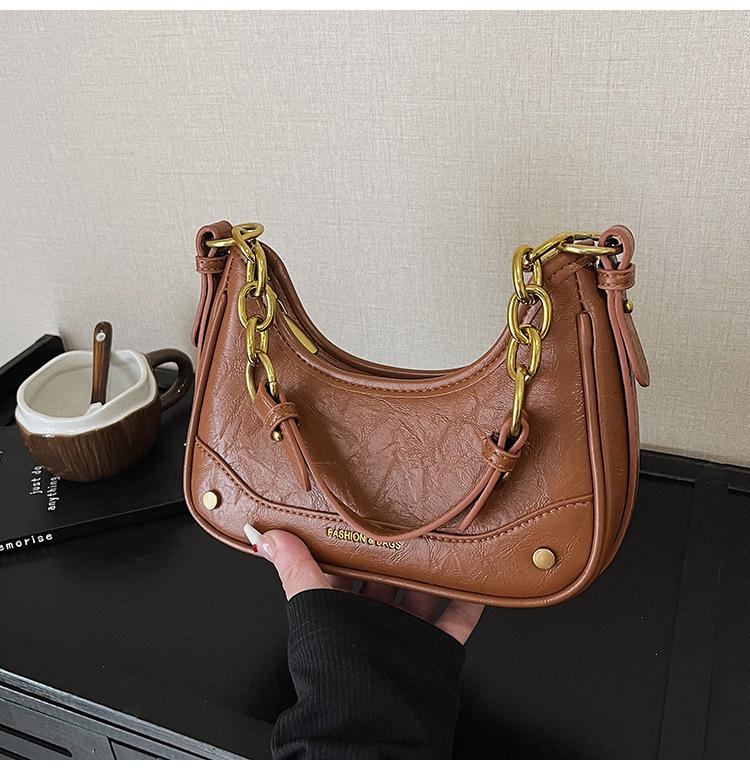 

Fashion medieval underarm small bag women s 2025 new retro high-end crescent bag niche design shoulder messenger bag